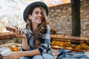 woman posing for picture outside